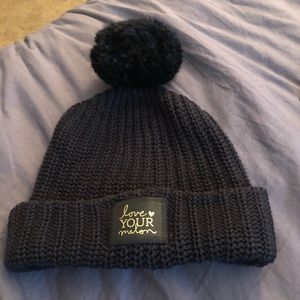 Love Your Melon Black Pom Beanie with Gold Writing